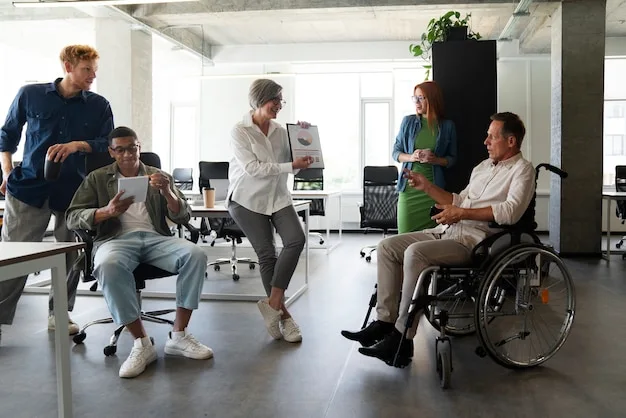 Collaboration inclusive dans une entreprise accueillant un travailleur handicapé.